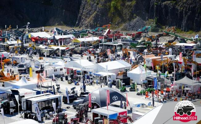 Overview of the Hillhead 2024 exhibition with various booths and equipment displays.